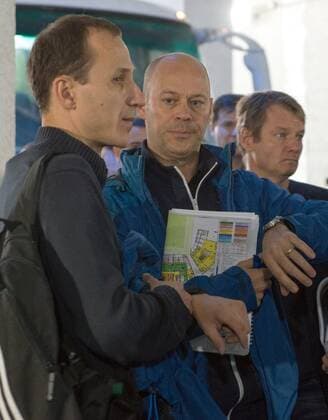 MOSCOW, RUSSIA. OCTOBER 18, 2014. FIFA inspection committee head Christian Unger (C) and FIFA and Russia 2018 officials in discussion at Fisht stadium which will become an arena for the coming 2018 FIFA World Cup. Artur Lebedev TASS  RE1522CF