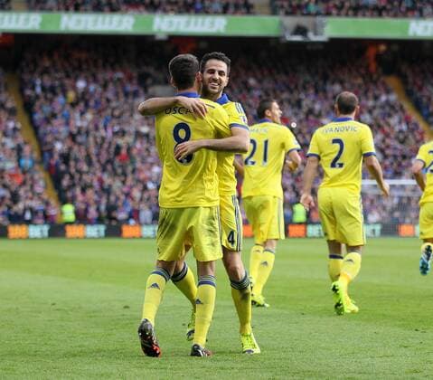 Chelsea s Cesc Fabregas celebrates scoring his sides second goal with Oscar - Barclays Premier League - Crystal Palace vs Chelsea - Selhurst Park - England - 18th October 2014 - Picture David Klein Sportimage EDITORIAL USE ONLY. No use with unauthorised audio, video, data, fixture lists, club league logos or live services. Online in-match use limited to 120 images, no video emulation. No use in betting, games or single club league player publications.