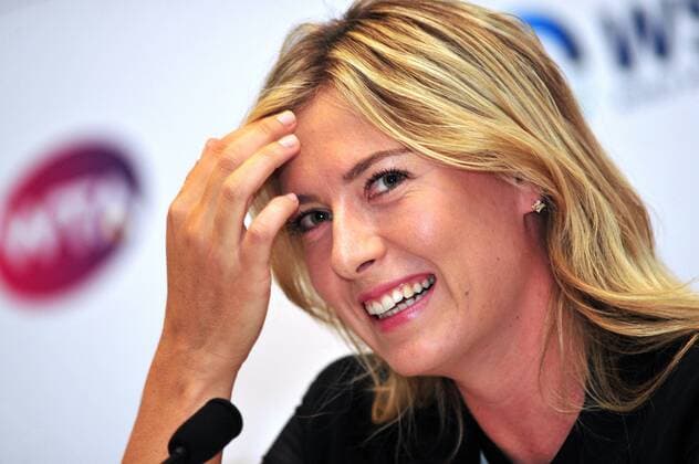 Russia s Maria Sharapova attends the press conference for the Women s Tennis Association (WTA) Finals in Singapore s Art Science Museum on Oct. 19, 2014. ) (SP)SINGAPORE-WTA-TENNIS-PRESS CONFERENCE ThenxChihxWey 