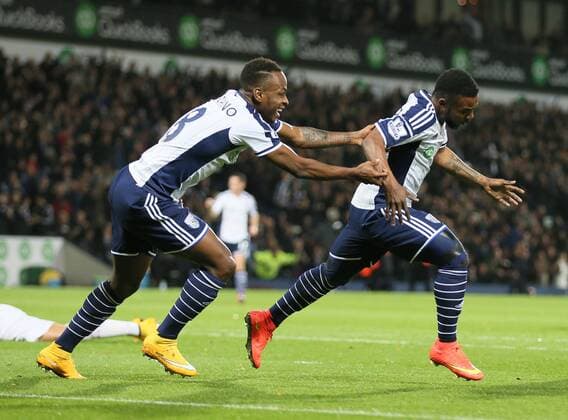 Stephane Sessegnon of West Bromwich Albion turns to celebrate scoring the first goal - Barclays Premier League - WBA vs Manchester Utd - Hawthorns Stadium - West Bromwich - England - 20th October 2014 - Picture Simon Bellis Sportimage EDITORIAL USE ONLY. No use with unauthorised audio, video, data, fixture lists, club league logos or live services. Online in-match use limited to 120 images, no video emulation. No use in betting, games or single club league player publications.
