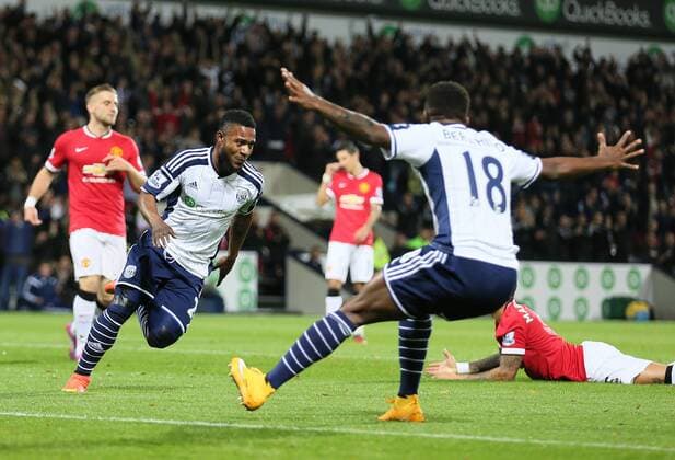 Stephane Sessegnon of West Bromwich Albion turns to celebrate scoring the first goal - Barclays Premier League - WBA vs Manchester Utd - Hawthorns Stadium - West Bromwich - England - 20th October 2014 - Picture Simon Bellis Sportimage EDITORIAL USE ONLY. No use with unauthorised audio, video, data, fixture lists, club league logos or live services. Online in-match use limited to 120 images, no video emulation. No use in betting, games or single club league player publications.