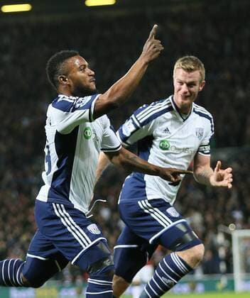 Stephane Sessegnon of West Bromwich Albion turns to celebrate scoring the first goal - Barclays Premier League - WBA vs Manchester Utd - Hawthorns Stadium - West Bromwich - England - 20th October 2014 - Picture Simon Bellis Sportimage EDITORIAL USE ONLY. No use with unauthorised audio, video, data, fixture lists, club league logos or live services. Online in-match use limited to 120 images, no video emulation. No use in betting, games or single club league player publications.