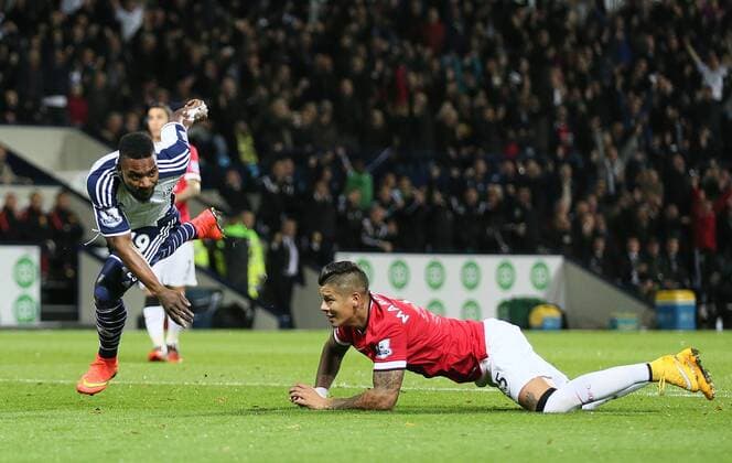 Stephane Sessegnon of West Bromwich Albion turns to celebrate scoring the first goal - Barclays Premier League - WBA vs Manchester Utd - Hawthorns Stadium - West Bromwich - England - 20th October 2014 - Picture Simon Bellis Sportimage EDITORIAL USE ONLY. No use with unauthorised audio, video, data, fixture lists, club league logos or live services. Online in-match use limited to 120 images, no video emulation. No use in betting, games or single club league player publications.