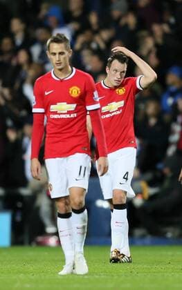 Phil Jones of Manchester United scratches his head following West Brom s second goal - Barclays Premier League - WBA vs Manchester Utd - Hawthorns Stadium - West Bromwich - England - 20th October 2014 - Picture Simon Bellis Sportimage EDITORIAL USE ONLY. No use with unauthorised audio, video, data, fixture lists, club league logos or live services. Online in-match use limited to 120 images, no video emulation. No use in betting, games or single club league player publications.