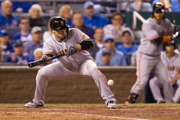 October 21, 2014: San Francisco Giants left fielder Juan Perez (2) bunts during the MLB Baseball Herren USA World Series game 1 between the San Francisco Giants and the Kansas City Royals at Kauffman Stadium in Kansas City, Missouri. MLB Baseball Herren USA OCT 21 World Series - Giants at Royals - Game 1 Icon20144699 EDITORIAL USE ONLY
