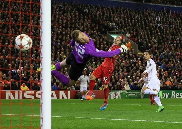 Cristiano Ronaldo of Real Madrid scores the first goal past Simon Mignolet of Liverpool - UEFA Champions League Group B - Liverpool vs Real Madrid - Anfield Stadium - Liverpool- England - 22nd October 2014 - Picture Simon Bellis Sportimage EDITORIAL USE ONLY. No use with unauthorised audio, video, data, fixture lists, club league logos or live services. Online in-match use limited to 120 images, no video emulation. No use in betting, games or single club league player publications.