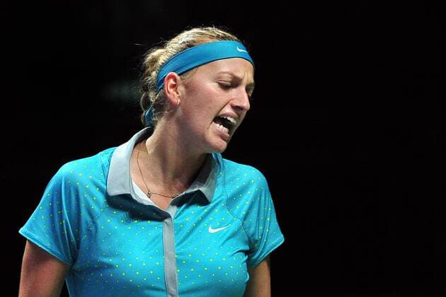 Czech Republic s Petra Kvitova reacts during the round robin match at the WTA Tennis Damen Finals at the Singapore Indoor Stadium, Oct. 24, 2014. ThenxChihxWey 