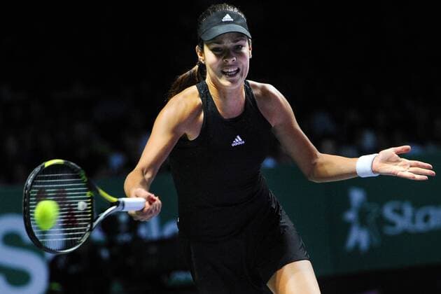 Serbia s Ana Ivanovic returns the ball during the round robin match at the WTA Tennis Damen Finals at the Singapore Indoor Stadium, Oct. 24, 2014. ) ThenxChihxWey 