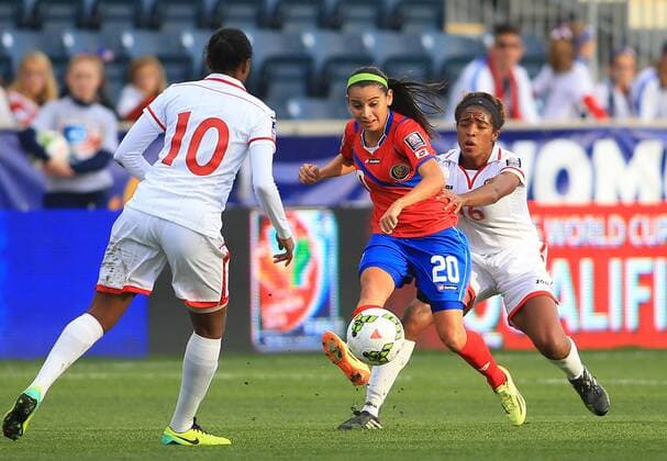 October 24 2014: Wendy Patricia Acosta (20) of Costa Rica makes a pass in front of Brianna Ryce (16) of Trinidad & Tobago during a CONCACAF Women s World Cup semi-final qualifier at PPL Park, in Chester PA. SOCCER: OCT 24 CONCACAF Women s World Cup Qualifier - Costa Rica v Trinidad & Tobago Icon25514102422 EDITORIAL USE ONLY