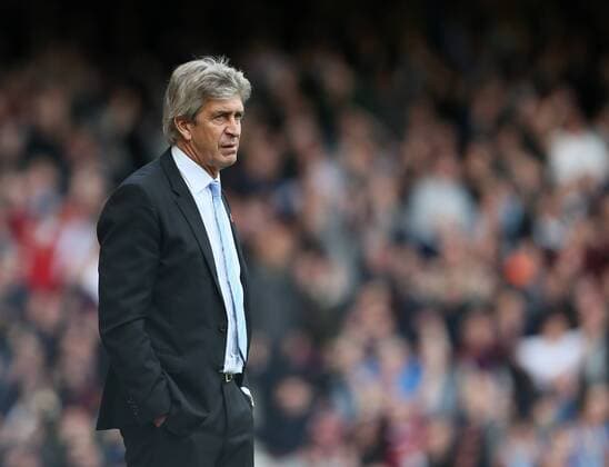 Manchester City s Manuel Pellegrini looks on dejected Barclays Premier League - West Ham United vs Manchester City - Upton Park - England - 25th October 2014 - Picture David Klein Sportimage EDITORIAL USE ONLY. No use with unauthorised audio, video, data, fixture lists, club league logos or live services. Online in-match use limited to 120 images, no video emulation. No use in betting, games or single club league player publications.