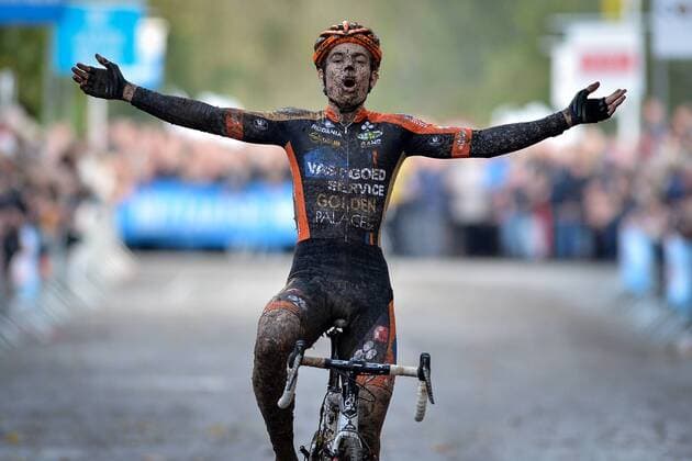 - KRUIBEKE, BELGIUM: Belgian Wout Van Aert celebrates as he crosses the finish line to win the second edition of the Poldercross cyclocross cycling race in Bazel, Kruibeke, Saturday 25 October 2014. DAVIDxSTOCKMAN  04489386