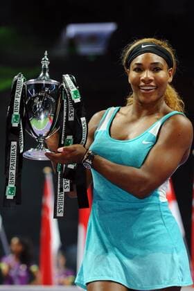 Serena Williams of the U.S. poses with the trophy during the awarding ceremony after the women s singles final match of WTA Tennis Damen Finals at the Singapore Indoor Stadium on Oct. 26, 2014. (SP)SINGAPORE-TENNIS-WTA-SINGLES FINAL ThenxChihxWey 