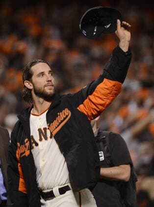 San Francisco Giants starting pitcher Madison Bumgarner waves after he earns his second win throwing a complete game against the Kansas City Royals during game 5 of the World Series at AT&T Park in San Francisco on October 26, 2014. The Giants took the pivotal game 5 beating the Royals 5-0 and now lead the series 3-2.  SXP2014102644