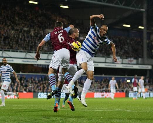 QPR s Bobby Zamora tussles with Aston Villa s Ciaran Clark Barclays Premier League - Queens Park Rangers Vs Aston Villa - Loftus Road - England - 27th October 2014 - Picture David Klein Sportimage EDITORIAL USE ONLY. No use with unauthorised audio, video, data, fixture lists, club league logos or live services. Online in-match use limited to 120 images, no video emulation. No use in betting, games or single club league player publications.
