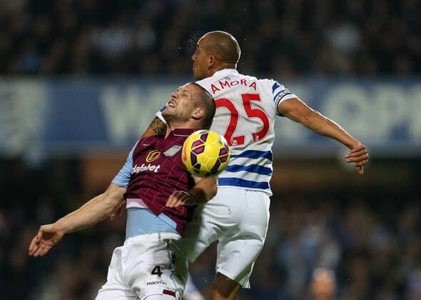 QPR s Bobby Zamora tussles with Aston Villa s Ron Vlaar Barclays Premier League - Queens Park Rangers Vs Aston Villa - Loftus Road - England - 27th October 2014 - Picture David Klein Sportimage EDITORIAL USE ONLY. No use with unauthorised audio, video, data, fixture lists, club league logos or live services. Online in-match use limited to 120 images, no video emulation. No use in betting, games or single club league player publications.