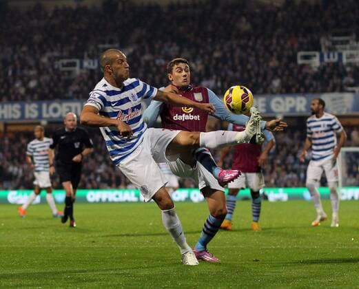 QPR s Bobby Zamora tussles with Aston Villa s Matthew Lowton Barclays Premier League - Queens Park Rangers Vs Aston Villa - Loftus Road - England - 27th October 2014 - Picture David Klein Sportimage EDITORIAL USE ONLY. No use with unauthorised audio, video, data, fixture lists, club league logos or live services. Online in-match use limited to 120 images, no video emulation. No use in betting, games or single club league player publications.