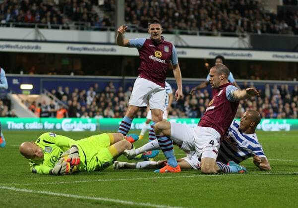 QPR s Bobby Zamora tussles with Aston Villa s Ron Vlaar and Brad Guzan Barclays Premier League - Queens Park Rangers Vs Aston Villa - Loftus Road - England - 27th October 2014 - Picture David Klein Sportimage EDITORIAL USE ONLY. No use with unauthorised audio, video, data, fixture lists, club league logos or live services. Online in-match use limited to 120 images, no video emulation. No use in betting, games or single club league player publications.