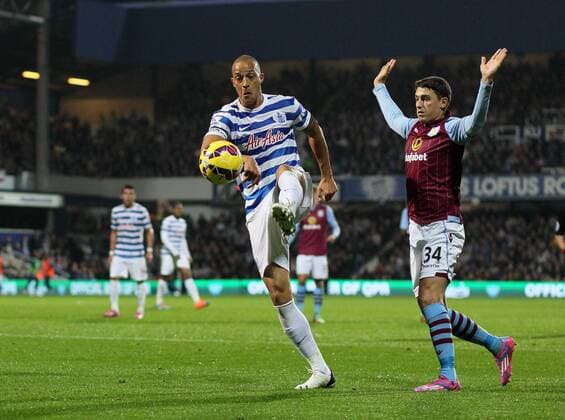 QPR s Bobby Zamora tussles with Aston Villa s Matthew Lowton Barclays Premier League - Queens Park Rangers Vs Aston Villa - Loftus Road - England - 27th October 2014 - Picture David Klein Sportimage EDITORIAL USE ONLY. No use with unauthorised audio, video, data, fixture lists, club league logos or live services. Online in-match use limited to 120 images, no video emulation. No use in betting, games or single club league player publications.