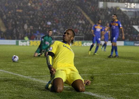 Didier Drogba of Chelsea celebrates scoring the first goal - Capital One Cup - Shrewsbury Town vs Chelsea - Greenhous Meadow Stadium - Shrewsbury - England - 28th October 2014 - Picture SimonBellis Sportimage EDITORIAL USE ONLY. No use with unauthorised audio, video, data, fixture lists, club league logos or live services. Online in-match use limited to 120 images, no video emulation. No use in betting, games or single club league player publications.