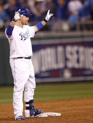Kansas City Royals DH Billy Butler reacts after a two-run double against the San Francisco Giants during the second inning of game 6 of the World Series at Kaufman Stadium in Kansas City, Missouri on October 22, 2014. San Francisco leads the series 3-2 over Kansas City.  KCP2014102854