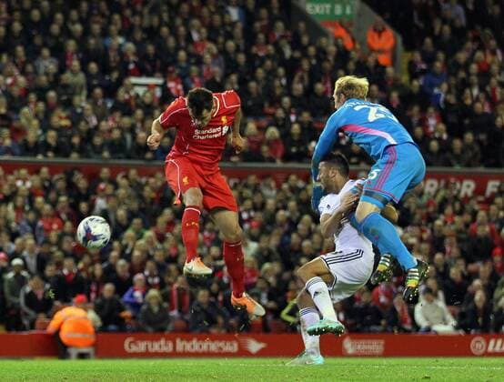 Liverpool s Dejan Lovren scoring his sides second goal League Cup Fourth Round- Liverpool vs Swansea City - Anfield - England - 28th October 2014 - Picture David Klein Sportimage EDITORIAL USE ONLY. No use with unauthorised audio, video, data, fixture lists, club league logos or live services. Online in-match use limited to 120 images, no video emulation. No use in betting, games or single club league player publications.