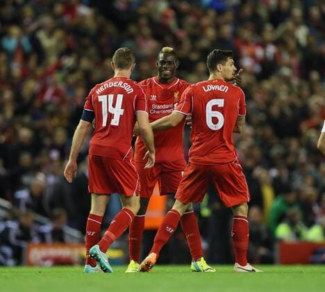 Liverpool s Mario Balotelli celebrates with goalscorer Dejan Lovren League Cup Fourth Round- Liverpool vs Swansea City - Anfield - England - 28th October 2014 - Picture David Klein Sportimage EDITORIAL USE ONLY. No use with unauthorised audio, video, data, fixture lists, club league logos or live services. Online in-match use limited to 120 images, no video emulation. No use in betting, games or single club league player publications.