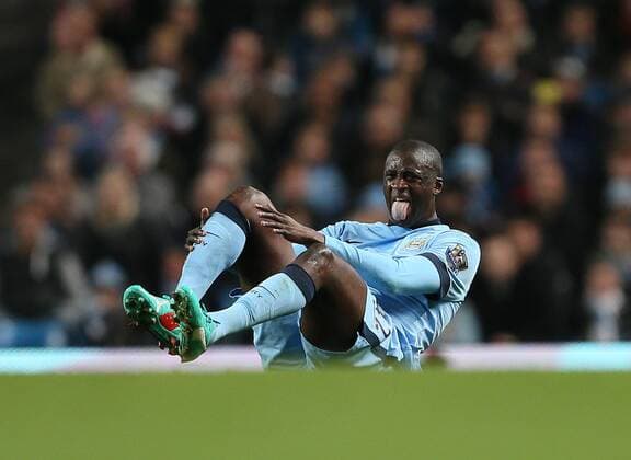 Manchester City s Yaya Toure sticks his tongue out League Cup Fourth Round- Manchester City vs Newcastle United - Etihad Stadium - England - 29th October 2014 - EDITORIAL USE ONLY. No use with unauthorised audio, video, data, fixture lists, club league logos or live services. Online in-match use limited to 120 images, no video emulation. No use in betting, games or single club league player publications.