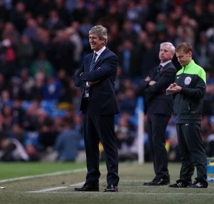 Manchester City s Manuel Pellegrini looks on dejected League Cup Fourth Round- Manchester City vs Newcastle United - Etihad Stadium - England - 29th October 2014 - EDITORIAL USE ONLY. No use with unauthorised audio, video, data, fixture lists, club league logos or live services. Online in-match use limited to 120 images, no video emulation. No use in betting, games or single club league player publications.