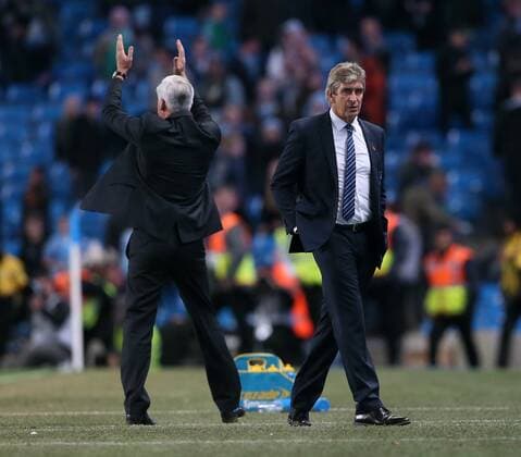 Manchester City s Manuel Pellegrini looks on dejected League Cup Fourth Round- Manchester City vs Newcastle United - Etihad Stadium - England - 29th October 2014 - EDITORIAL USE ONLY. No use with unauthorised audio, video, data, fixture lists, club league logos or live services. Online in-match use limited to 120 images, no video emulation. No use in betting, games or single club league player publications.