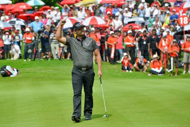 (141102) -- KUALA LUMPUR, Nov. 2, 2014 -- Ryan Moore of the US celebrates after winning the 2014 CIMB Classic golf tournament in Kuala Lumpur on November 2, 2014. ) (SP)MALAYSIA-KUALA LUMPUR-GOLF ChongxVoonxChung 