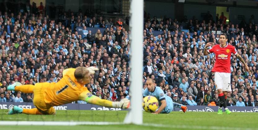 Joe Hart of Manchester City saves a shot from Angel Di Maria of Manchester United - Barclays Premier League - Manchester City vs Manchester Utd - Etihad Stadium - Manchester - England - 2nd November 2014 - Picture David Klein Sportimage EDITORIAL USE ONLY. No use with unauthorised audio, video, data, fixture lists, club league logos or live services. Online in-match use limited to 120 images, no video emulation. No use in betting, games or single club league player publications.