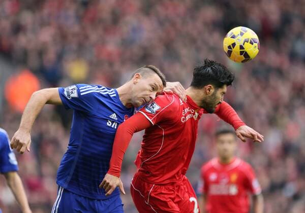 John Terry of Chelsea challenges Emre Can of Liverpool - Barclays Premier League - Liverpool vs Chelsea - Anfield Stadium - Liverpool - England - 8th November 2014 - Picture Simon Bellis Sportimage EDITORIAL USE ONLY. No use with unauthorised audio, video, data, fixture lists, club league logos or live services. Online in-match use limited to 120 images, no video emulation. No use in betting, games or single club league player publications.