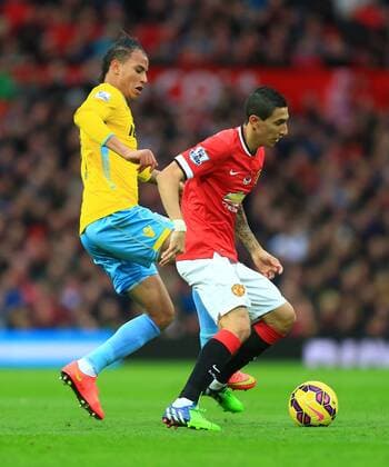 Marouane Chamakh of Crystal Palace pressures Angel di Maria of Manchester United - Manchester United vs. Crystal Palace - Barclay s Premier League - Old Trafford - Manchester - 08 11 2014 Pic Philip Oldham Sportimage EDITORIAL USE ONLY. No use with unauthorised audio, video, data, fixture lists, club league logos or live services. Online in-match use limited to 120 images, no video emulation. No use in betting, games or single club league player publications.