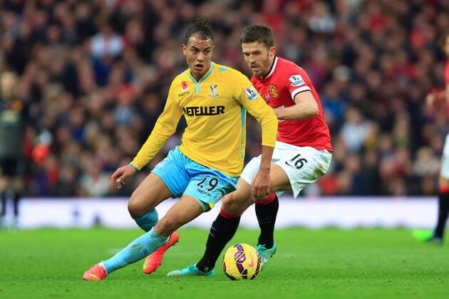 Marouane Chamakh of Crystal Palace out turns Michael Carrick of Manchester United - Manchester United vs. Crystal Palace - Barclay s Premier League - Old Trafford - Manchester - 08 11 2014 Pic Philip Oldham Sportimage EDITORIAL USE ONLY. No use with unauthorised audio, video, data, fixture lists, club league logos or live services. Online in-match use limited to 120 images, no video emulation. No use in betting, games or single club league player publications.