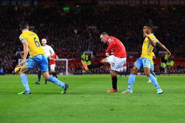 Wayne Rooney of Manchester United strikes at goal - Manchester United vs. Crystal Palace - Barclay s Premier League - Old Trafford - Manchester - 08 11 2014 Pic Philip Oldham Sportimage EDITORIAL USE ONLY. No use with unauthorised audio, video, data, fixture lists, club league logos or live services. Online in-match use limited to 120 images, no video emulation. No use in betting, games or single club league player publications.