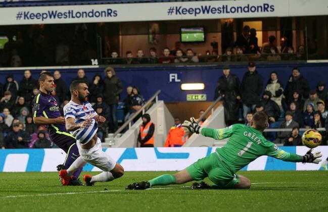 Manchester City s Sergio Kun Agüero scoring his sides opening goal - Barclays Premier League - Queens Park Rangers vs Manchester City- Loftus Road - London - England - 8th November 2014 - Picture David Klein Sportimage EDITORIAL USE ONLY. No use with unauthorised audio, video, data, fixture lists, club league logos or live services. Online in-match use limited to 120 images, no video emulation. No use in betting, games or single club league player publications.