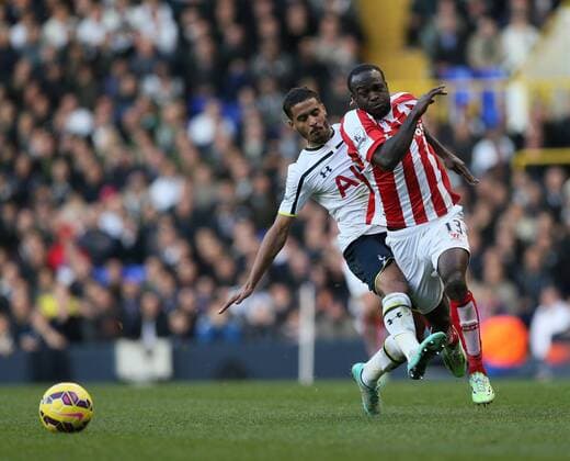 Tottenham s Kyle Naughton gets sent off for this tackle on Stoke s Victor Moses - Barclays Premier League - Tottenham Hotspur vs Stoke City- White Hart Lane - London - England - 9th November 2014 - Picture David Klein Sportimage EDITORIAL USE ONLY. No use with unauthorised audio, video, data, fixture lists, club league logos or live services. Online in-match use limited to 120 images, no video emulation. No use in betting, games or single club league player publications.