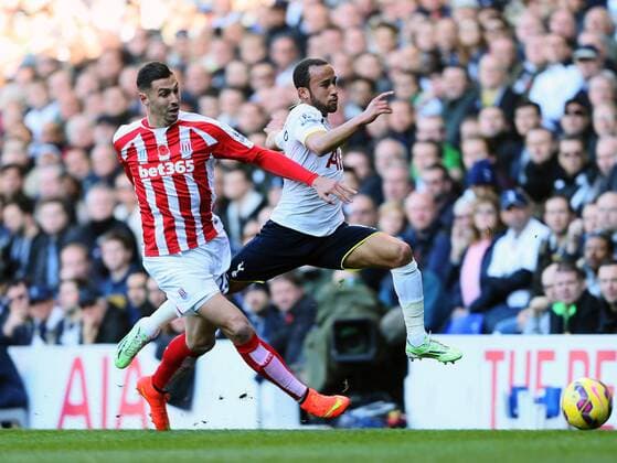 Tottenham s Andros Townsend tussles with Stoke s Geoff Cameron - Barclays Premier League - Tottenham Hotspur vs Stoke City- White Hart Lane - London - England - 9th November 2014 - Picture David Klein Sportimage EDITORIAL USE ONLY. No use with unauthorised audio, video, data, fixture lists, club league logos or live services. Online in-match use limited to 120 images, no video emulation. No use in betting, games or single club league player publications.