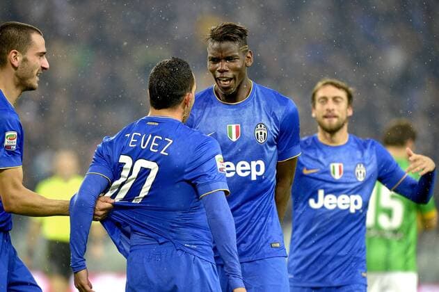 Aktuell Fussball, Italien, Serie A, Juventus Turin - FC Parma Esultanza Carlos Tevez e Paul Pogba Juventus dopo gol, goal celebration, Torino 09-11-2014, Juventus Stadium, Football Calcio 2014 2015 Serie A, Juventus - Parma, Foto Filippo Alfero Insidefoto filippoxalfero