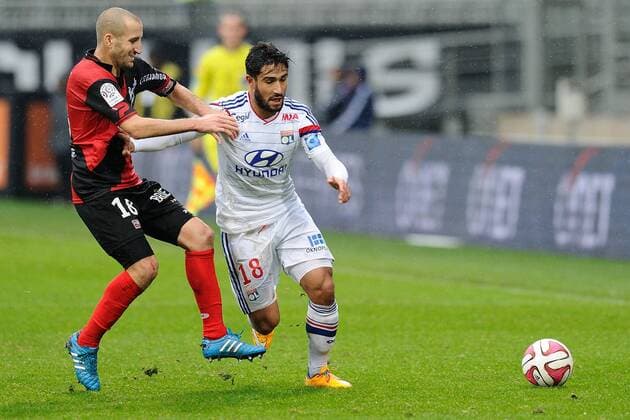 Nabil Fekir (lyon) vs Lionel Mathis (guingamp) FOOTBALL : Lyon vs Guingamp - Ligue 1 - 09 11 2014 FredericChambert Panoramic 