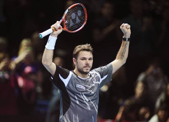 Tennis - 2014 ATP Tennis Herren World Tour Finals at The 02 - Day One Group A Singles: Stanislas Wawrinka celebrates winning in two straight sets 