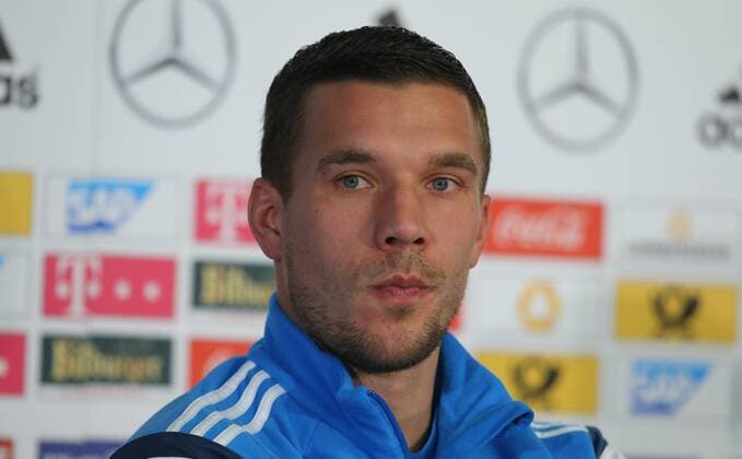 Lukas Podolski bei der Pressekonferenz Deutschland - Gibraltar Pressekonferenz ,Fussball, Nationalmannschaft, DFB, Deutscher Fussball Bund, 2014, Fußball, Fussball, soccer, Herren, Deutschland, Germany. Pressekonferenz, PK, Berlin, 11.11.2014