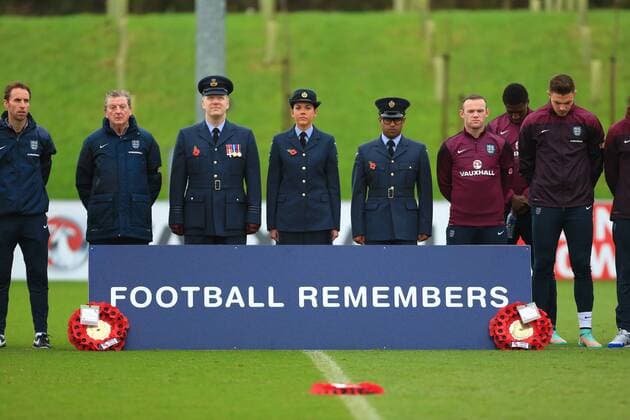 Roy Hodgson, England manager and Wayne Rooney join service personnel for two minutes silence - England Training & Press Conference - UEFA Euro 2016 Qualifying - St George s Park - Burton-upon-Trent - 11 11 2014 Pic Philip Oldham Sportimage EDITORIAL USE ONLY. No use with unauthorised audio, video, data, fixture lists, club league logos or live services. Online in-match use limited to 120 images, no video emulation. No use in betting, games or single club league player publications.