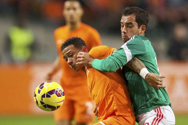 (L-R) Memphis Depay of Holland, Adrian Aldrete of Mexico during the International friendly match between Netherlands and Mexico on November 12, 2014 at the Amsterdam Arena in Amsterdam, The Netherlands. Netherlands v Mexico International Friendly 2014 2015 xVIxxIVx 3267515