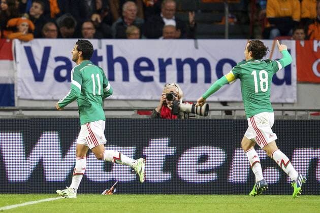 (L-R) Carlos Vela of Mexico, Andres Guardado of Mexico during the International friendly match between Netherlands and Mexico on November 12, 2014 at the Amsterdam Arena in Amsterdam, The Netherlands. Netherlands v Mexico International Friendly 2014 2015 xVIxxIVx 3267938