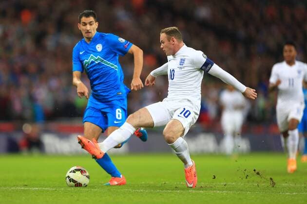 Wayne Rooney of England latches on to a long ball but fails to capitalise - England vs. Slovenia - UEFA Euro 2016 Qualifying - Wembley Stadium - London - 15 11 2014 Pic Philip Oldham Sportimage EDITORIAL USE ONLY. No use with unauthorised audio, video, data, fixture lists, club league logos or live services. Online in-match use limited to 120 images, no video emulation. No use in betting, games or single club league player publications.
