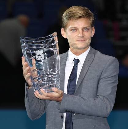 TENNIS - ATP, World Tour Finals 2014 LONDON,ENGLAND,15.NOV.14 - TENNIS - ATP Tennis Herren World Tour, World Tour Finals 2014. Image shows David Goffin (BEL). Keywords: trophy. 
