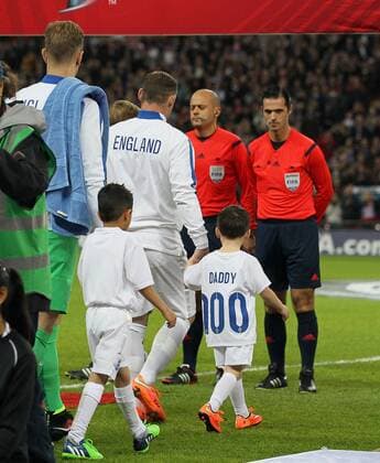 England s Wayne Rooney holds his sons Klay and Kai - International European Qualifier - England - - Wembley Stadium - London - England - 15th November 2014 - Picture DavidxKlein Sportimage EDITORIAL USE ONLY. No use with unauthorised audio, video, data, fixture lists, club league logos or live services. Online in-match use limited to 120 images, no video emulation. No use in betting, games or single club league player publications.