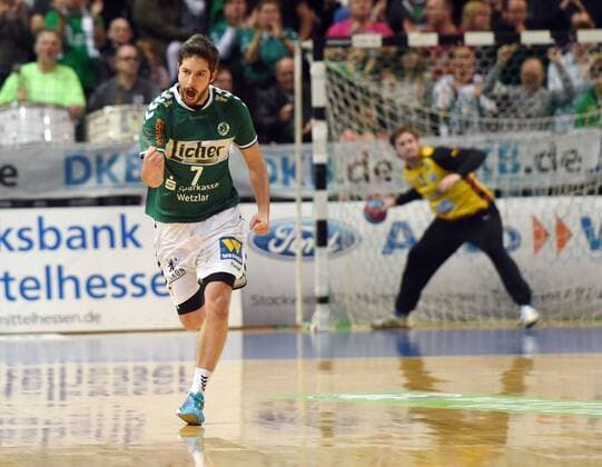 15.11.2014, xjhx, Handball HBL, HSG Wetzlar - Bergischer HC, v.l. Christian Rompf (HSG Wetzlar) jubeln jubelt nach Spielende.