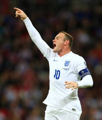 Wayne Rooney of England barks orders - England vs. Slovenia - UEFA Euro 2016 Qualifying - Wembley Stadium - London - 15 11 2014 Pic Philip Oldham Sportimage EDITORIAL USE ONLY. No use with unauthorised audio, video, data, fixture lists, club league logos or live services. Online in-match use limited to 120 images, no video emulation. No use in betting, games or single club league player publications.